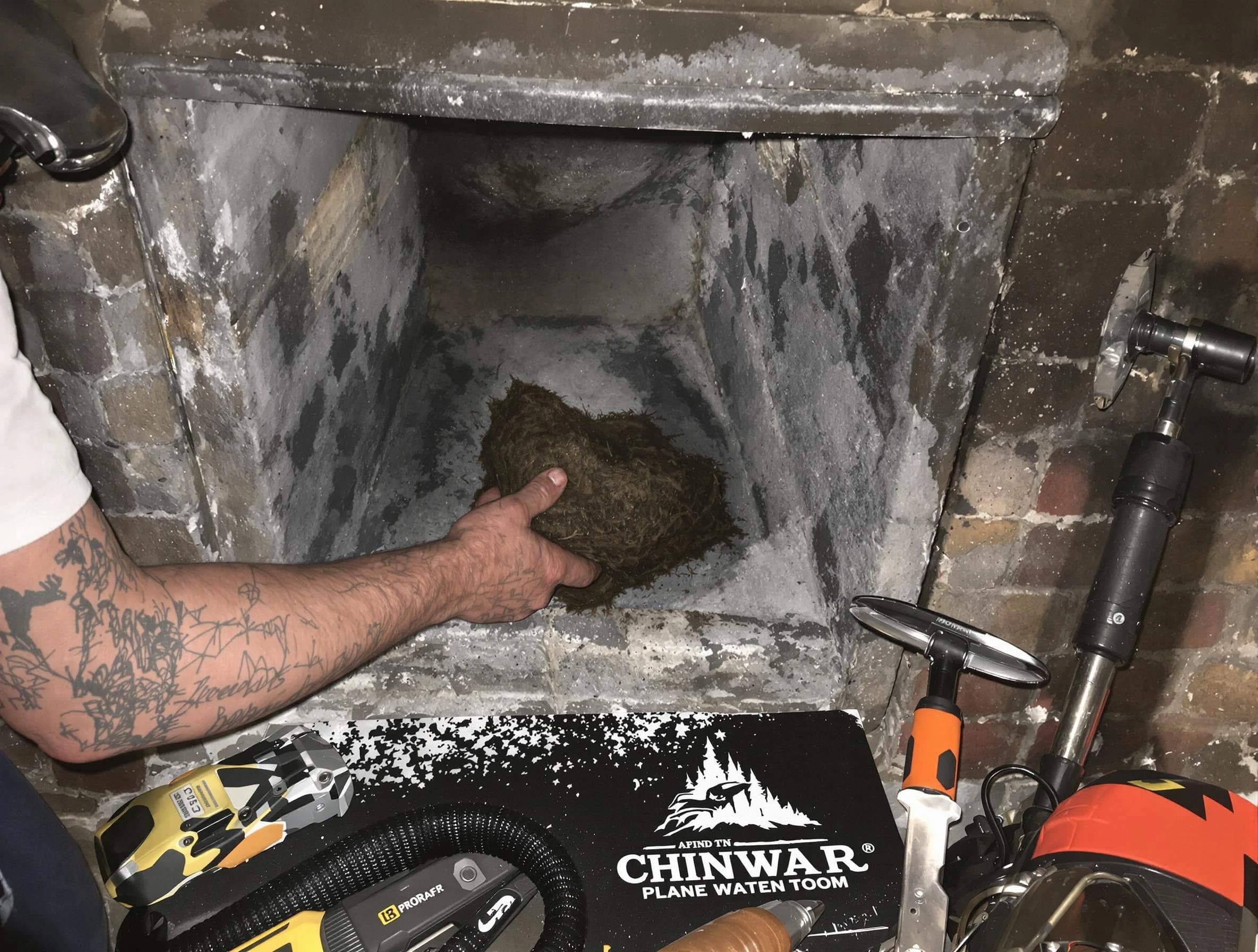 Oak Hill Chimney Sweep safely removing debris and screening chimney in Oak Hill, TN